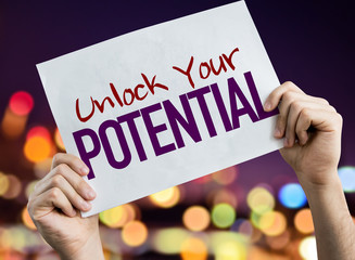Unlock Your Potential placard with night lights on background