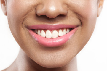 Obraz premium Cheerful girl is satisfied with her appearance