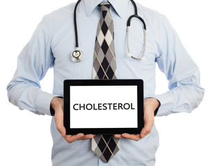 Doctor holding tablet - Cholesterol