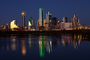 Downtowwn Dallas, Texas at night with the Trinity River in the forground - obrazy, fototapety, plakaty
