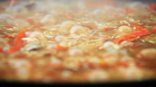 A close-up footage of the traditional Near East meal pilaf boiling