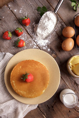homemade pancake with strawberry topping