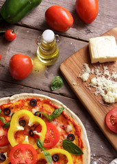 italian pizza with tomatoes, olive oil, and chesse