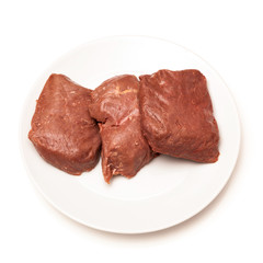 Cooked Ostrich meat steaks.