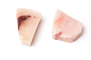 Swordfish steak portions isolated on a white studio background.