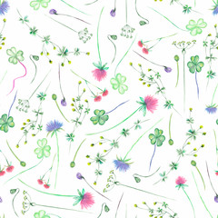 Seamless floral pattern with yellow wildflowers, clover flower and grass, painted in watercolor on a white background