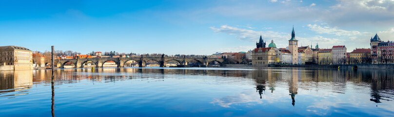 Fototapeta premium Prague, Charles bridge reflected in Vltava river