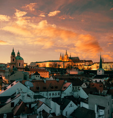 Roofs of Prague and St. Vitus Cathedral in the evening