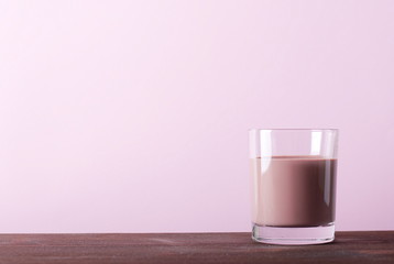 chocolate milk on a pink background