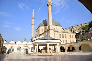 Fototapeta na wymiar View of mosque against blue sky