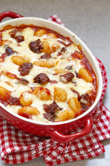 Homemade gnocchi with sausage and sauce