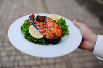 baked red fish with a lemon