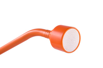Orange soft watering nozzle isolated on white background