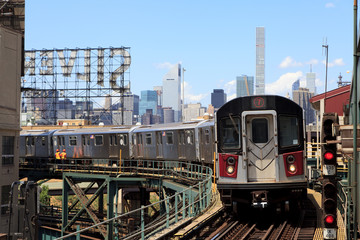 Naklejka na ściany i meble New York, NY, USA - June 7, 2016: 7 line subway :A Subway Train Approaching a Station in New York