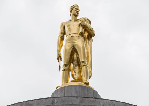 Golden Oregon Pioneer Atop The State's Capitol Building In Salem