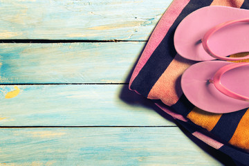 Summer beach accesories on wooden boards