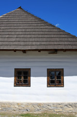 Old style house detail with two windows