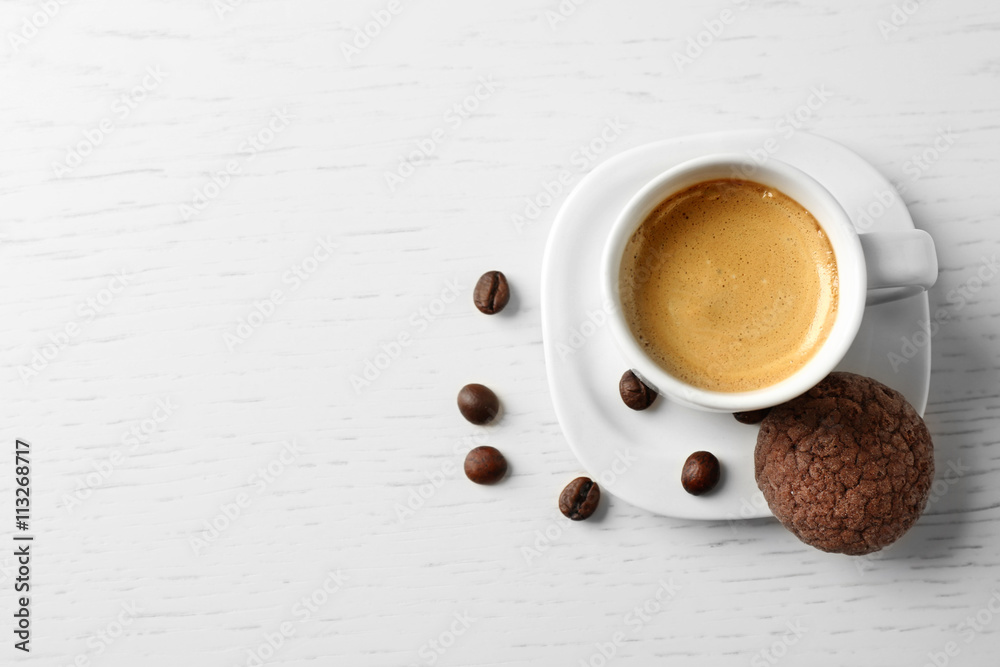 Poster Cup of coffee with cookie on wooden table