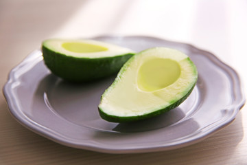 Fresh sliced avocado on plate