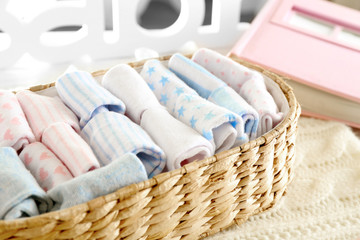 Clean baby linen on knitted plaid