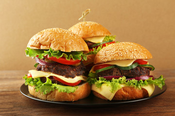 Double hamburgers on wooden table