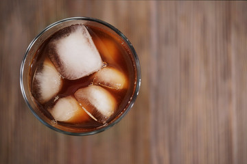 Cold coffee on wooden table