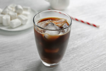 Cold coffee on wooden table