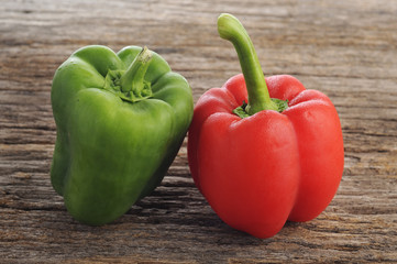 Fresh Red and Green Bell Pepper On Wooden Background