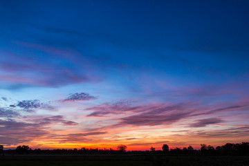 Colorful dawn sky countryside.