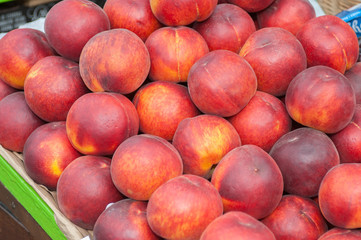 Fototapeta na wymiar Pile of delicious, organic plums on display. 
