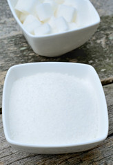 White sugar in ceramic bowl