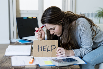 young woman asking for help suffering stress doing domestic accounting paperwork bills