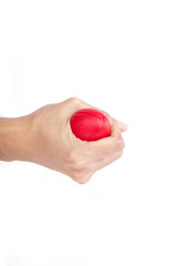 Hands of a woman squeezing a stress ball