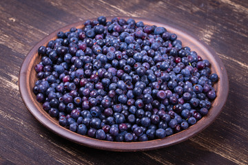 Fresh blueberries in wooden table
