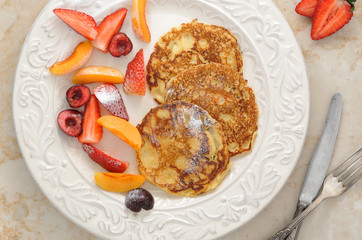 dessert - pancakes with strawberries, peach, and black cherry wi