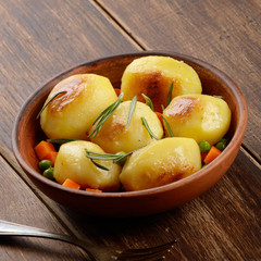 Boiled and baked potato and vegetables