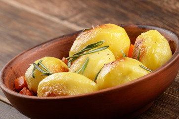 Boiled and baked potato and vegetables