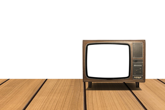 Old Television with clipping path on wooden floor