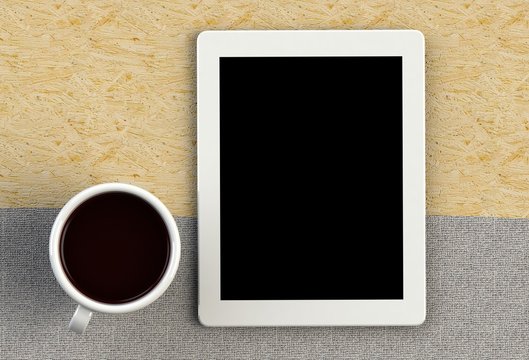 Coffee cup with tablet on gray fabric and wood table, 3D rendering