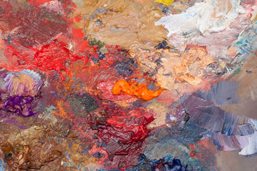 Fototapeta na wymiar Colorful brushstrokes on artist's palette