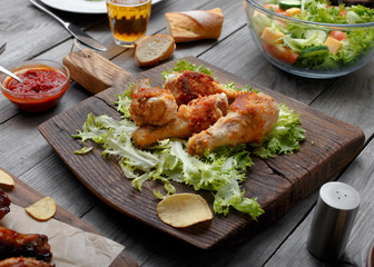 Grilled chicken legs with sauce