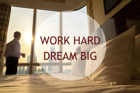 Business man morning. Motivational text "Work hard Dream big"