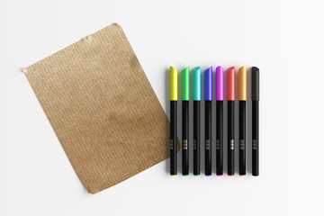 Fototapeta premium Colorful pens with sheet of paper
