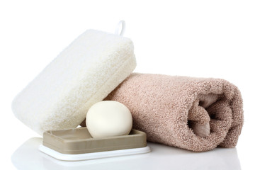 Obraz na płótnie Canvas soap dish with soap and a towel and washcloth on a white isolated background