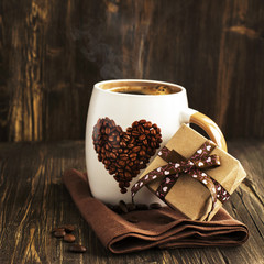 Cup of coffee and gift box