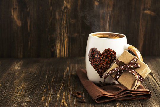 Fototapeta Cup of coffee and gift box