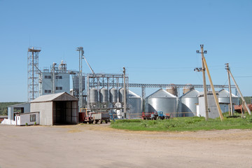 Metal grainery on a bright sunny summer day