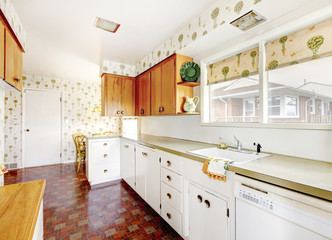 White and brown kitchen interior with tile and floral patterned