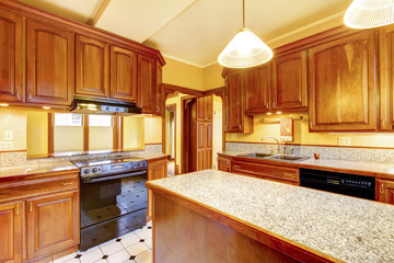 Kitchen interior design with island, granite countertop and tile