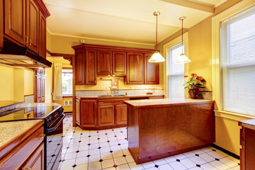 Kitchen interior design with island, granite countertop and tile